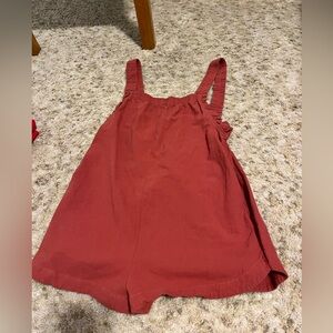 Mini red romper out of canvas material